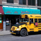 Image for article titled This Is A School Bus Parked In Front Of A Porn Store